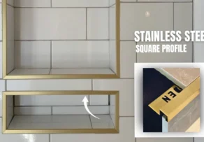 A modern shower niche installation featuring a gold-finished stainless steel square profile trim, highlighting the precision fabrication of a Stainless Steel Manufacturer UAE.