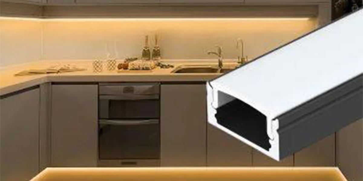 Surface Mounted LED Profiles Manufacturer UAE Modern kitchen featuring warm under-cabinet lighting using surface-mounted aluminum channels from a leading LED profiles manufacturer in UAE.