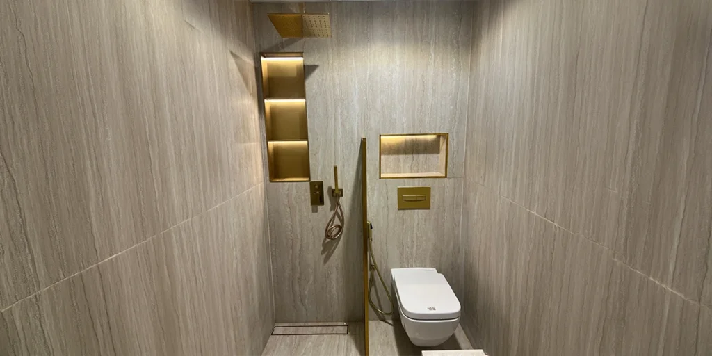 Floor drain supplier showcasing a linear floor drain in a modern tiled bathroom