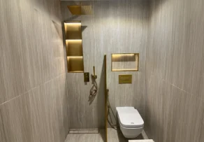 Floor Drain Supplier: Matching Drainage Products to Different Flooring Materials 1 Floor drain supplier showcasing a linear floor drain in a modern tiled bathroom