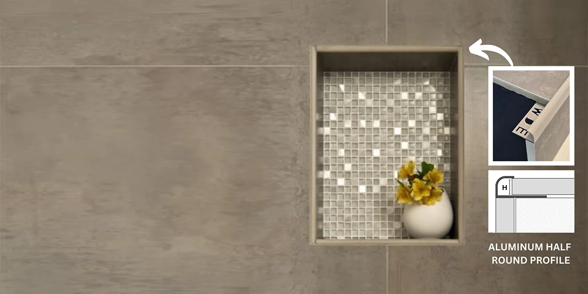 Tile Trim Manufacturer – Aluminum Half Round Profile for Recessed Wall Tile Finishing Tile Trim Manufacturer showcasing an aluminum half round profile for a recessed wall niche with modern ceramic tile installation.