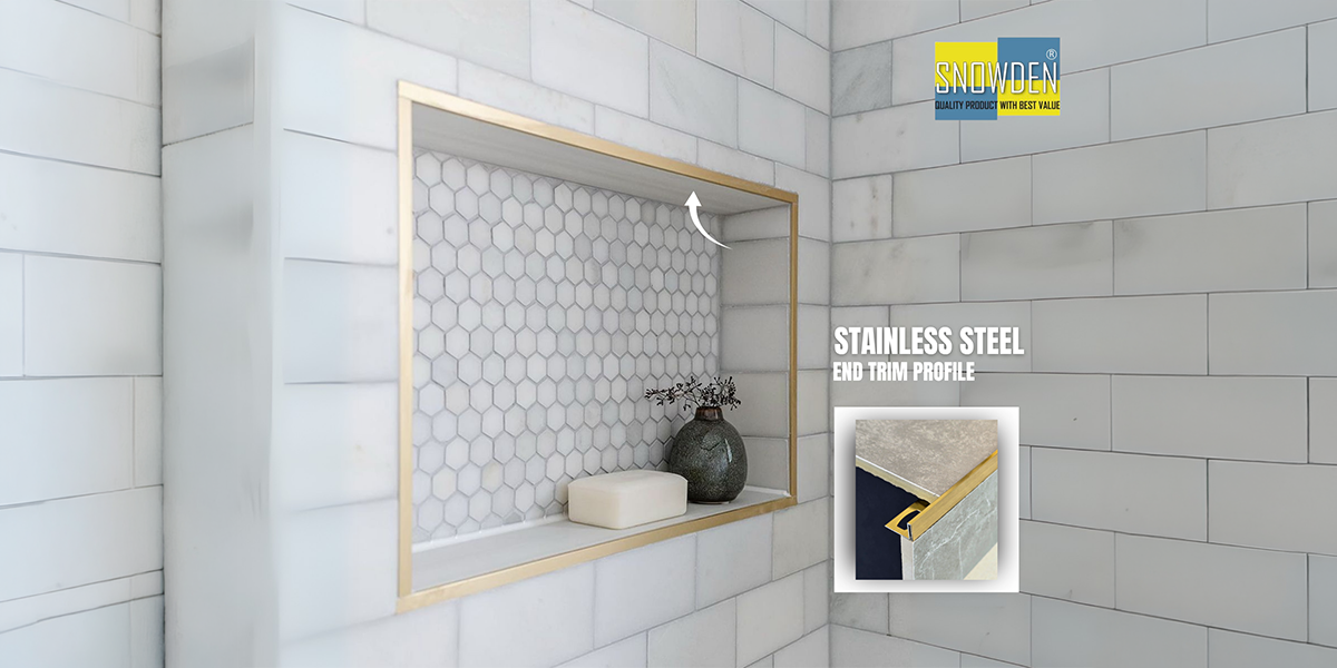 Stainless Steel Profiles Manufacturer UAE: How Can Stainless Steel Trims Support Consistent Interior Finishes? 1 Gold end trim profile installed around a tiled bathroom shower niche, produced by a Stainless Steel Profiles Manufacturer UAE.