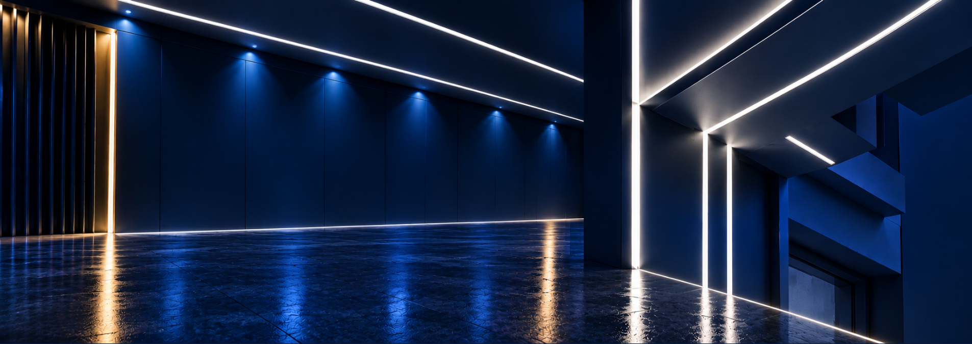Contemporary blue showroom displaying red installation tools, architectural profile samples, and product displays beneath dramatic blue and warm white lighting.